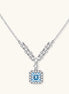 Sterling silver necklace with geometric crystal arrangement forming a V-shape and square blue moissanite centerpiece pendant