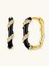 Small gold-plated hoop earrings with black enamel stripes and cubic zirconia crystals on white background.