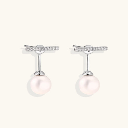 Rhodium-plated sterling silver ear jacket earrings with diamond-set horizontal bar and freshwater pearl drop