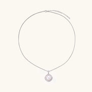 Cushion-shaped double halo pendant with 10mm freshwater pearl center on rhodium-plated sterling silver chain