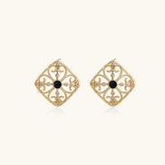 Gold filigree stud earrings with navy lapis lazuli center stone and mother-of-pearl accents in ornate quatrefoil design