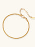 Delicate 18K gold-plated stainless steel bracelet with textured beaded chain on cream background