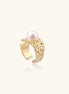 Wide gold-plated ring with organic textured band and white freshwater pearl centerpiece