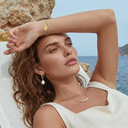 Golden Arc Necklace by Clarivon
